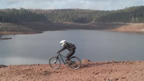 MTB rider over the sky side view slowmo 03 Video stock 148334189