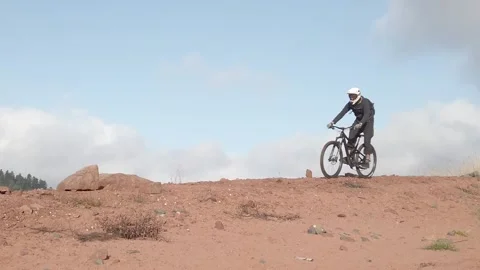 MTB rider over the sky side view 02 Video stock 148337662
