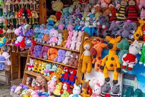 Mtskheta, Georgia - 10 May, 2025: Children's toy dolls displayed for sale a.. Stock-Fotos