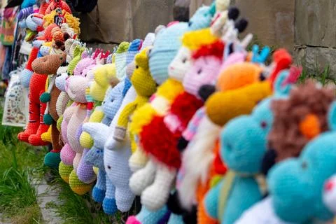 Mtskheta, Georgia - 10 May, 2025: Children's toy dolls displayed for sale a.. Stock-Fotos