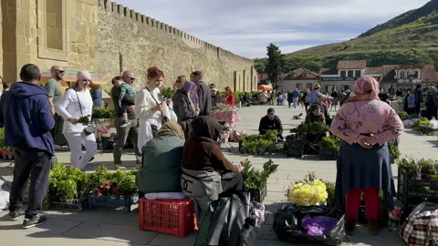 Mtskheta, Georgia - 5.14.2023: People walking near Svetitskhoveli Cathedral Video stock 264257144