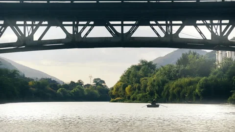 Mtskheta, Georgia - 9.9.2023: Boat with man under Princess Jorjoliani Bridge Stock Footage 264265951