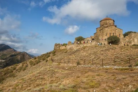 MTSKHETA, GEORGIA - SEPTEMBER 23, 2018: Many people visit the ancient Jvari m Stock Photos