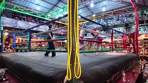 Muay Thai boxing match taking place at the famous Reggae Bar Koh Phi Phi Don in Stock Footage 331079988