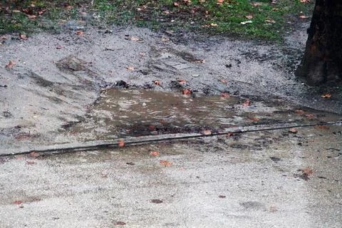 Mud and a large puddle in rainy weather Stock Photos