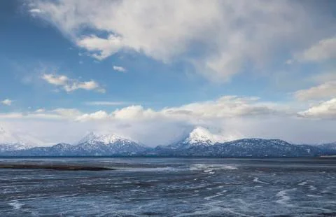 Mud bay with clouds Stock Photos