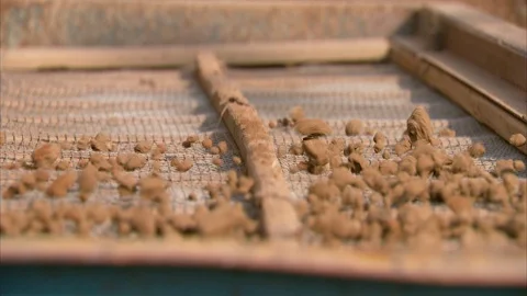 Mud being sieved at construction site Stock-Footage 88544888