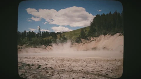 Mud Caldron in the Mud Volcano Area Along the Grand Loop Road in Yellowstone  Stock Footage 136731496