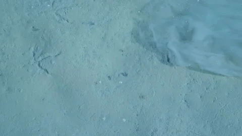 Mud coming out in the sea Stock Footage 232578288