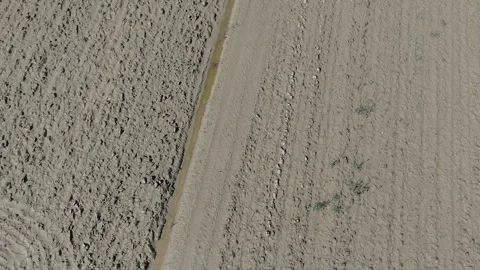 Mud-covered Agricultural Fields in Romagna after the 2024 Flood Stock Footage 287483359