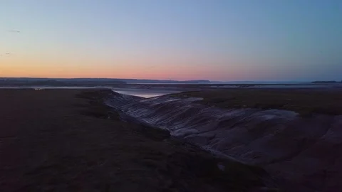 Mud flats at low tide and sunset, Wolfville, Nova Scotia - Canada Video stock 119340539