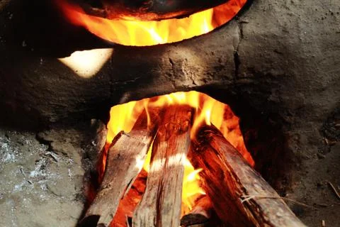 Mud hearth burning Stock Photos