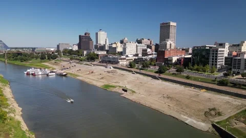 Mud Island Slide Right – Low Drone Shot with Memphis Skyline and Speed Boat Stock Footage 320807017
