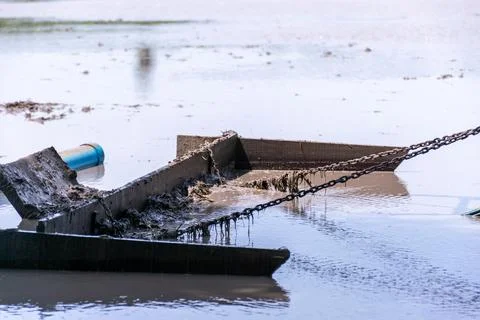 Mud Leveling Tool in Flooded Rice Field Stock Photos
