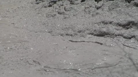 Mud Puddle Boiling Close Up Stock Footage 11442564