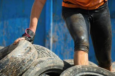 Mud race runners Stock Photos