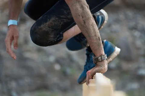 Mud race runners Stock Photos