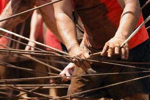 Mud race runners Stock Photos