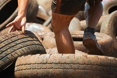 Mud race runners Stock Photos