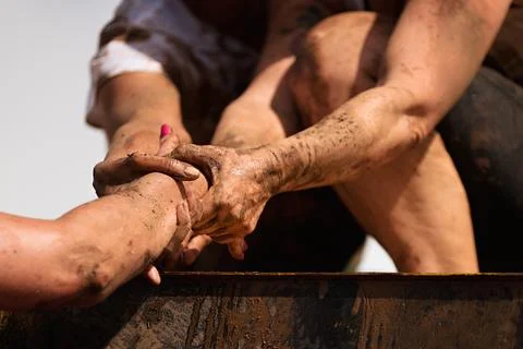 Mud race runners Stock Photos