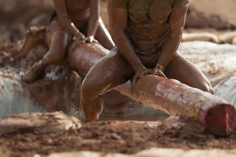 Mud race runners Stock Photos