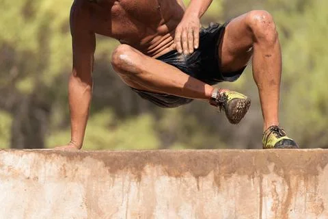 Mud race runners Stock Photos