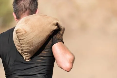 Mud race runners Stock Photos