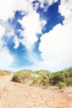 Mud road against cloudy sky Stock Illustration