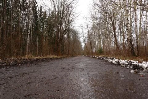Mud, snow and road Stock Photos