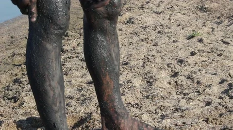 Mud therapy. Mud bathing Stockbeeldmateriaal 65148458