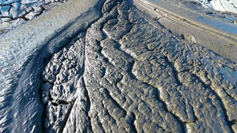 Mud volcano. Always active mud volcanoes surrounded by mountains Stock Footage 277670042