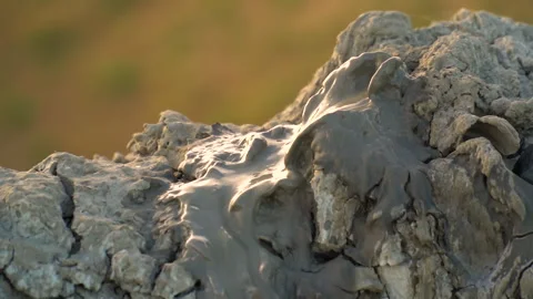 Mud volcano. Always active mud volcanoes surrounded by mountains Stock Footage 277670503