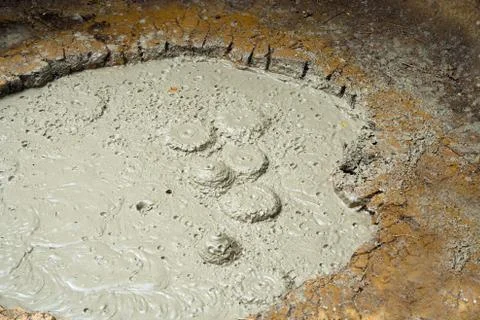 Mud volcano boiling, close up Stock Photos