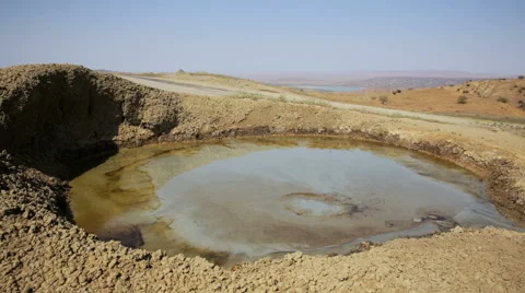 Mud volcano bubbling methane gas (Tahti Tepa, Georgia) 動画素材 41832498