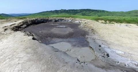 Mud Volcano Bubbling, With Muddy Water Coming Out Of It Stock Footage 64984823