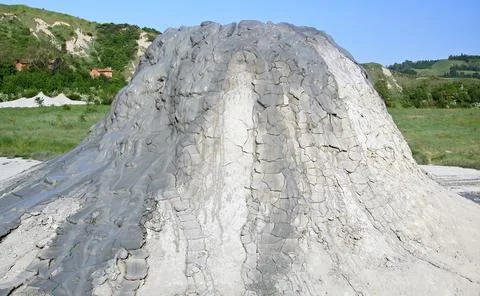 Mud volcano flowing down clayey mud mixed with hydrocarbons. Italy Foto stock
