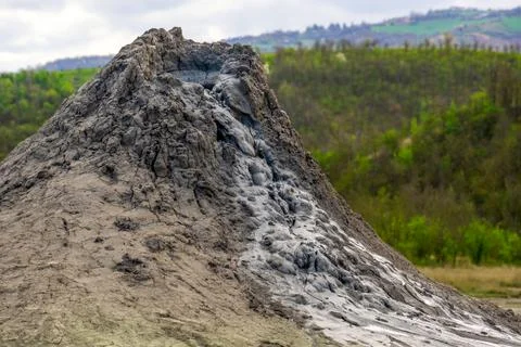 Mud volcano or mud dome in Italy, geological phenomenon by eruption of mud Stock Photos
