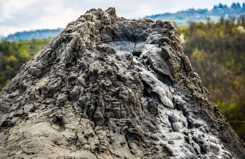 Mud volcano or mud dome in Italy, geological phenomenon by eruption of mud Stock Photos