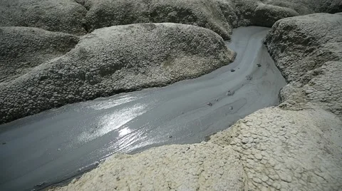 Mud volcanoes also known as mud domes erupting in summer season Vídeo Stock 65205170