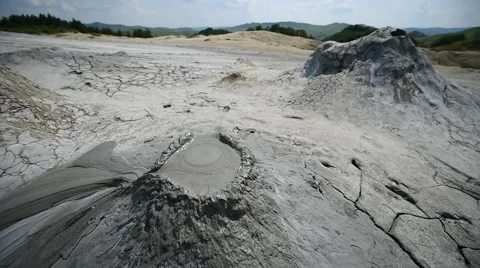 Mud volcanoes also known as mud domes erupting in summer season Stock Footage 65205187