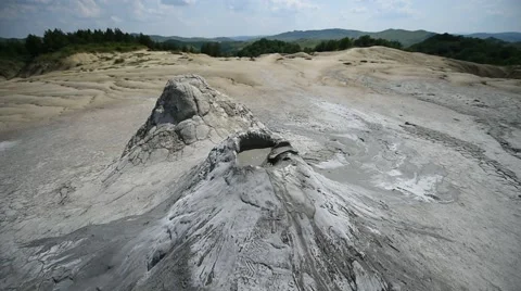 Mud volcanoes also known as mud domes erupting in summer season Video stock 65205192