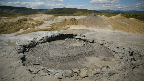 Mud volcanoes also known as mud domes boiling in summer season Stock Footage 71616191