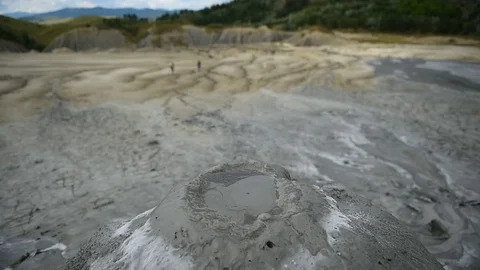 Mud volcanoes also known as mud domes boiling in summer season Stock-Footage 71616239