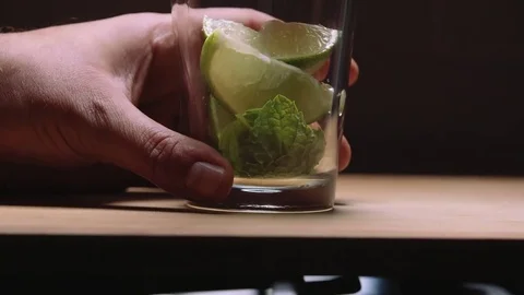 Muddling Limes for a Mojito Stock Footage 83862823