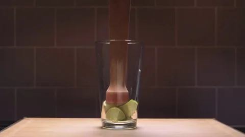 Muddling Limes for a Mojito Stock Footage 83862832