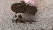 Muddy Boot Falling Onto Carpet In Slow Motion; Shot On Phantom Flex 4K At 1000 Stock Footage