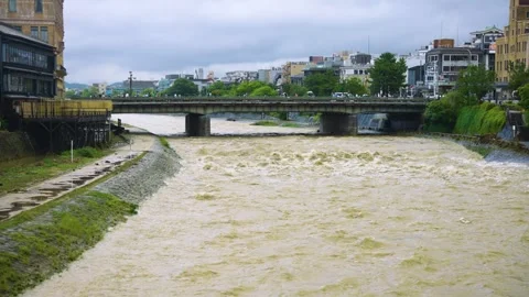 Muddy Flood Water Surge Through Kyoto, Typhoon Season Japan Stock Footage 340180117