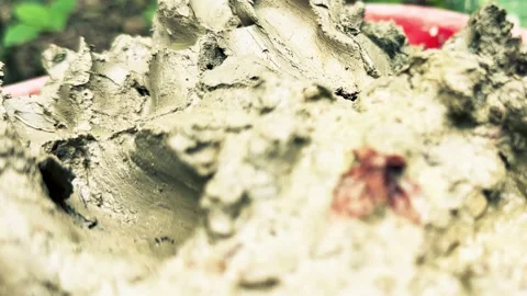 Muddy Ground Surface Shifting and Rippling, Showcasing Earthy Textures Stock Footage 344884188