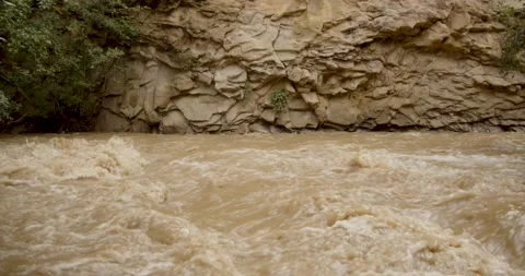 Muddy mountain river Stock Footage 232138814