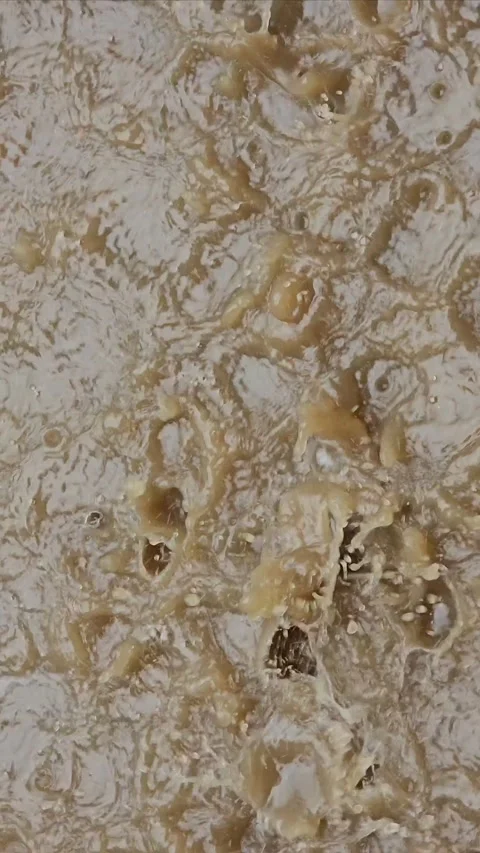 Muddy Puddle During Heavy Rainfall Video stock 330588246